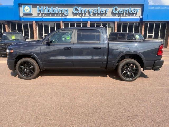 2026 RAM Ram 1500 Laramie in Forged Blue Metallic — front three-quarter view