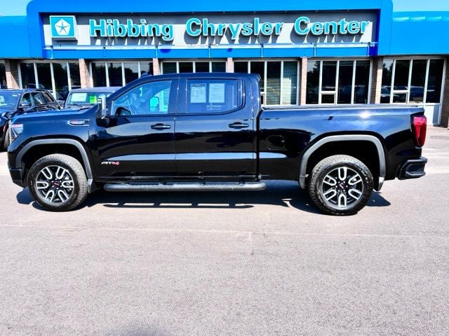 2024 GMC Sierra 1500 AT4 in Onyx Black — front three-quarter view