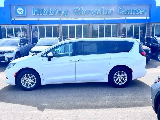 2023 Chrysler Voyager LX in Bright White Clearcoat — front three-quarter view