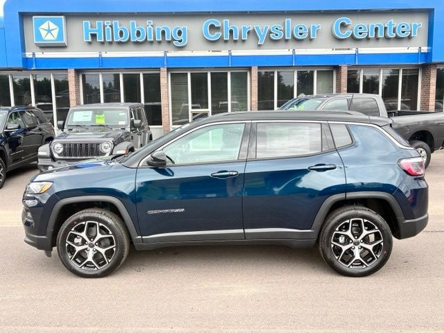 2026 Jeep Compass Limited in Fathom Blue Pearl Coat — front three-quarter view
