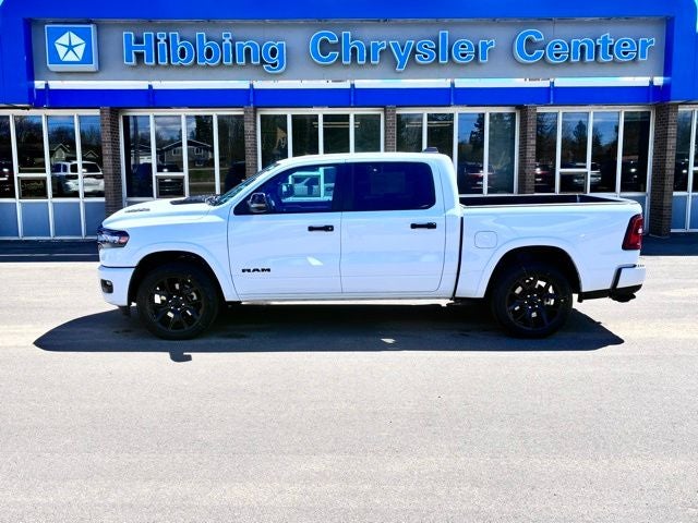 2026 RAM Ram 1500 Laramie in Bright White Clearcoat — front three-quarter view