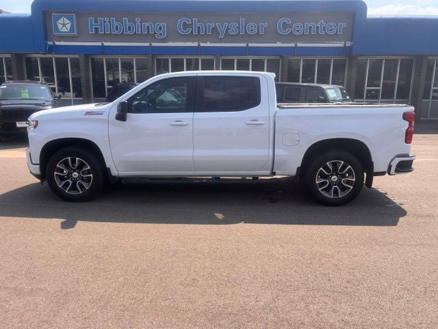 2021 Chevrolet Silverado 1500 RST in Summit White — front three-quarter view