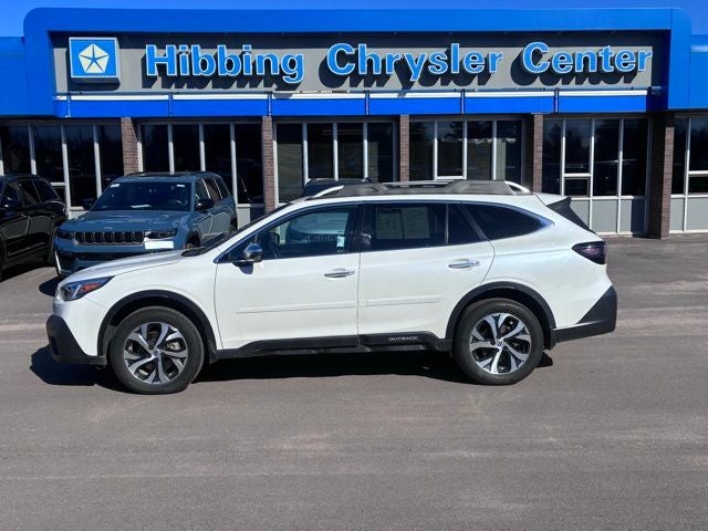 2021 Subaru Outback Touring XT in Crystal White Pearl — front three-quarter view