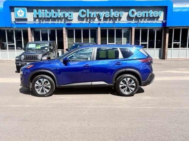 2023 Nissan Rogue SV in Caspian Blue Metallic — front three-quarter view